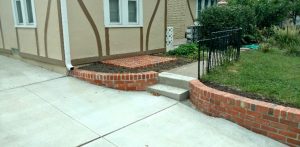 new-driveway-and-brick-retaining-wall