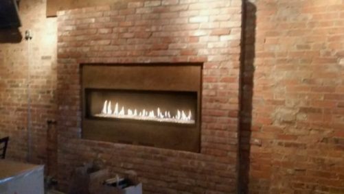 Refaced modern indoor fireplace