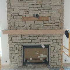 new-stone-stacked-fireplace